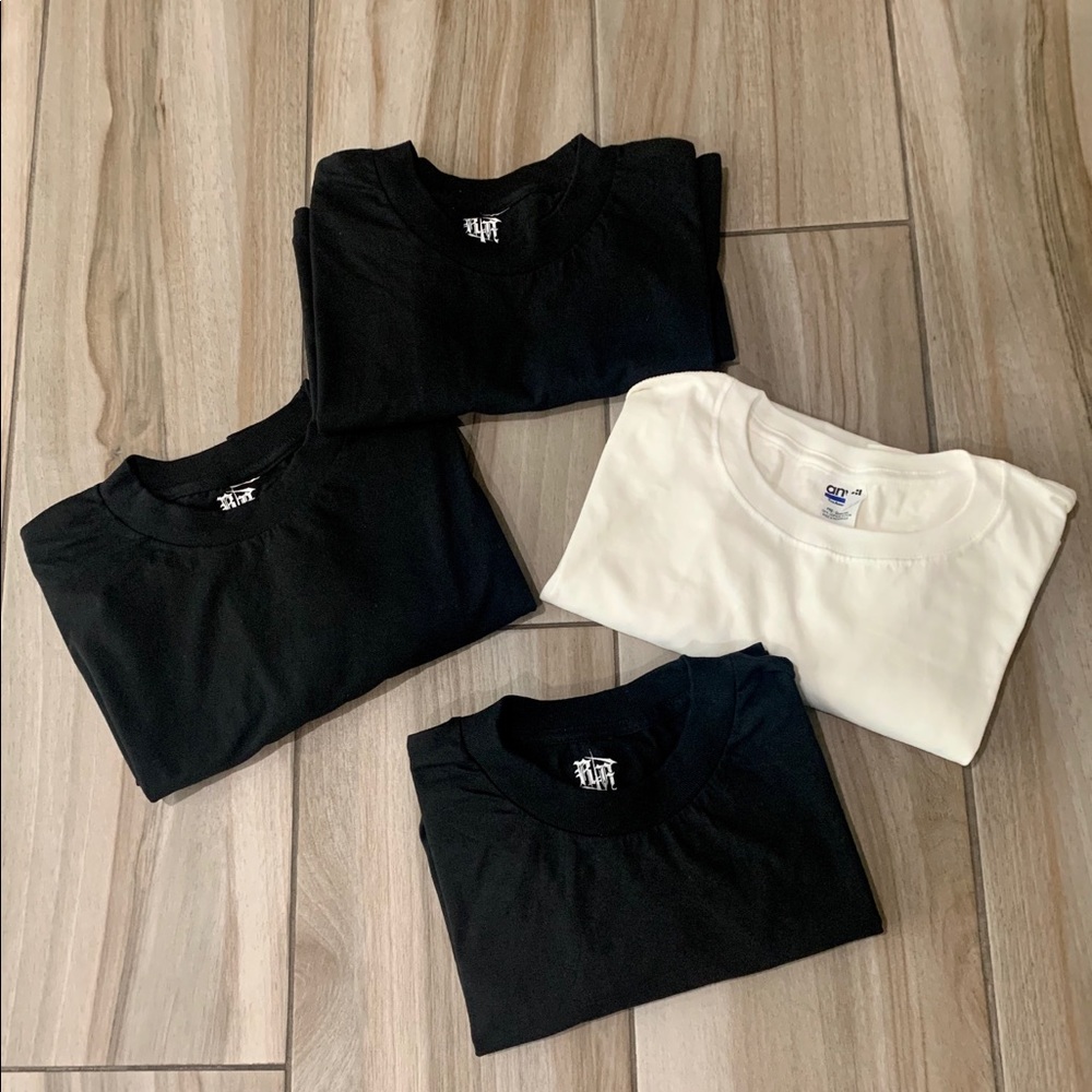Set of 4 NWOT T-shirts 3 in black & 1 in white
